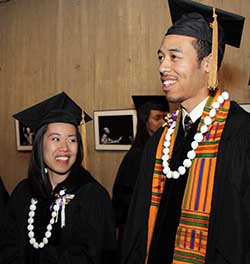 Joanna Kwok and Micah Nicholson savor the excitement before the graduation ceremony.