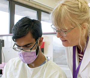 Dr. Cindy Folsom (’80) and Mahfuz Rahman (’16)