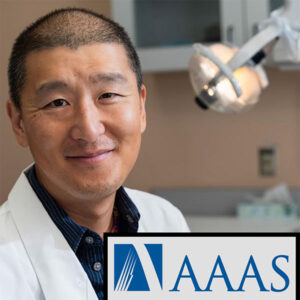 Dr. Chi with AAAS logo