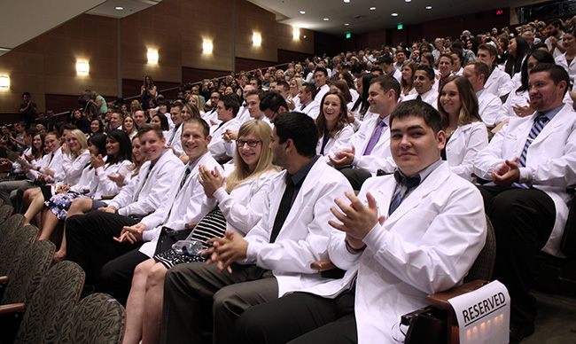 Class of 2018 in white coats
