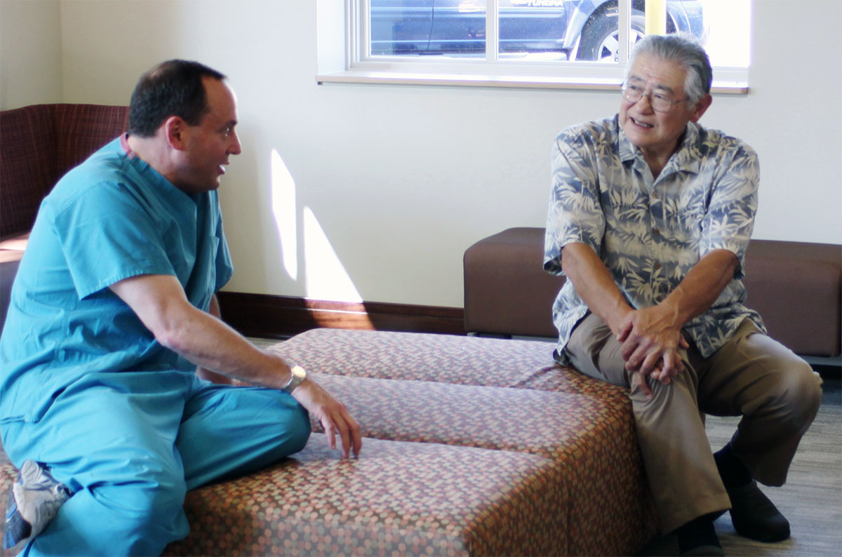 Dr. Domoto talking with former Dean Joel Berg at the Center for Pediatric Dentistry