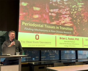 Brian Foster at podium giving a presentation