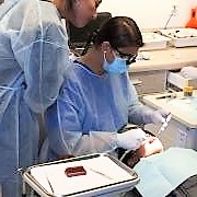 Dental therapist with patient