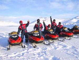 Golden Circle with people on snowmobiles