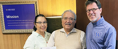 Dr. Narvaez and Norma Zavala celebrate the scholarship gift with Dean Ritter