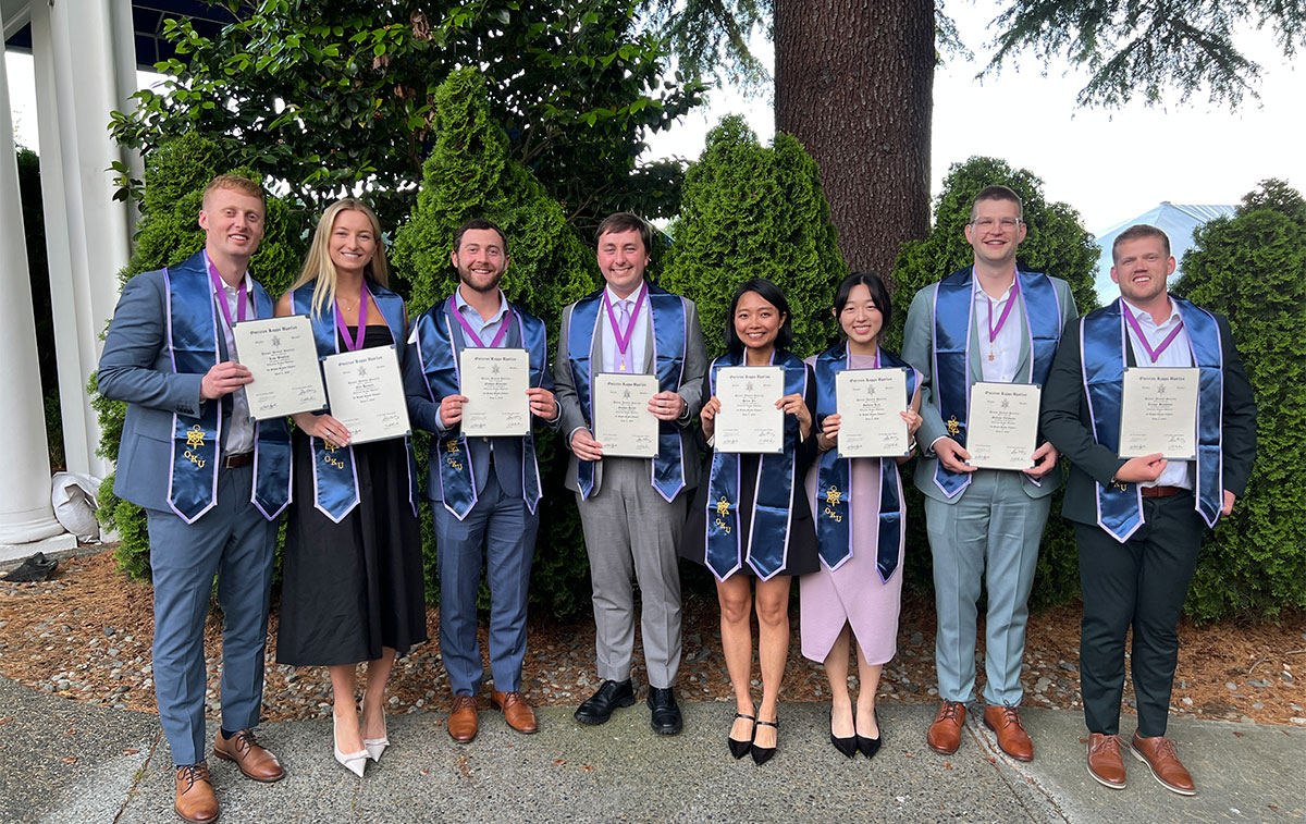 From left to right) Levi Wooley, Elle Hansen, Nathan Giaccone, Nathan Dahm, Helen Wu, Sydney Kim, Gunnar Velikanje, and Trevor Bushman