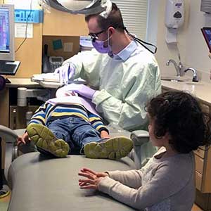 Pete Harbert with child patient