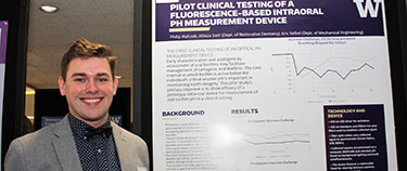 Philip Walczak with Research Poster