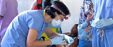 Dr. Cheng treating a patient