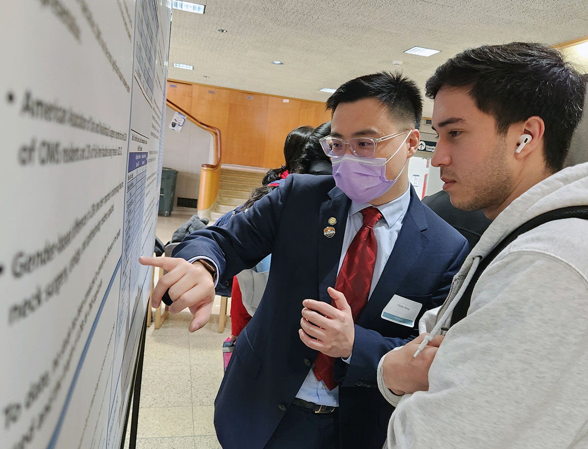 DDS student Teddy Dong presents his research at the School’s annual Research Day. 