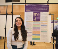 student with poster
