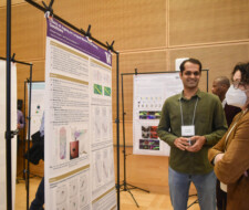 student with poster