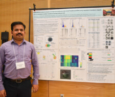 student with poster