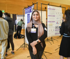 student with poster