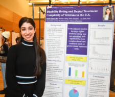 sudent with poster