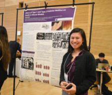 student with poster