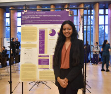 sudent with poster
