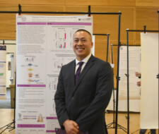 sudent with poster