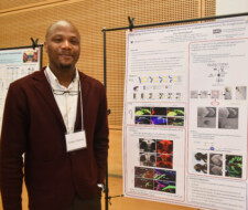sudent with poster
