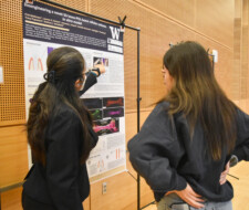 Student with poster