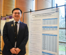 sudent with poster