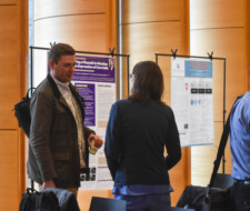 student with poster