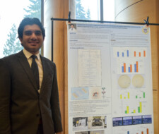 student with poster