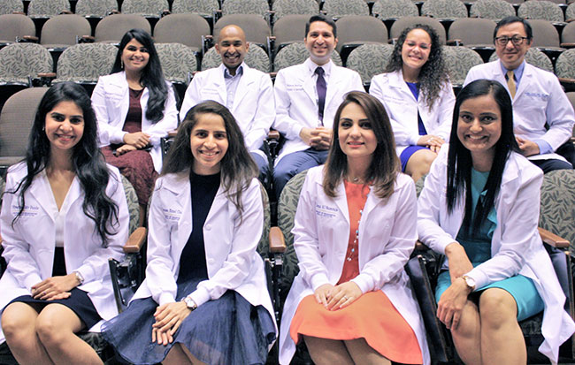 international students and their advisors at the 2019 white coat ceremony