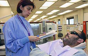 Dentist with patient