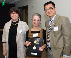 Dr. Susan Herring (center) joins Dr. Sue Coldwell and Dr. Zhang after her induction as honorary faculty member. Dr. Art DiMarco, inducted as faculty member, was unable to attend.