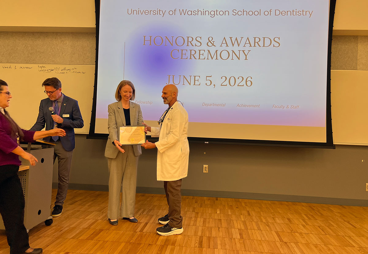 Dr. Jillian Grant was presented with the Wands Fellowship plaque by Dean Ritter and Dr. Van Ramos at the 2026 UWSOD Honors & Awards ceremony.