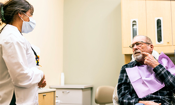 RIDE student with older patient in clinic