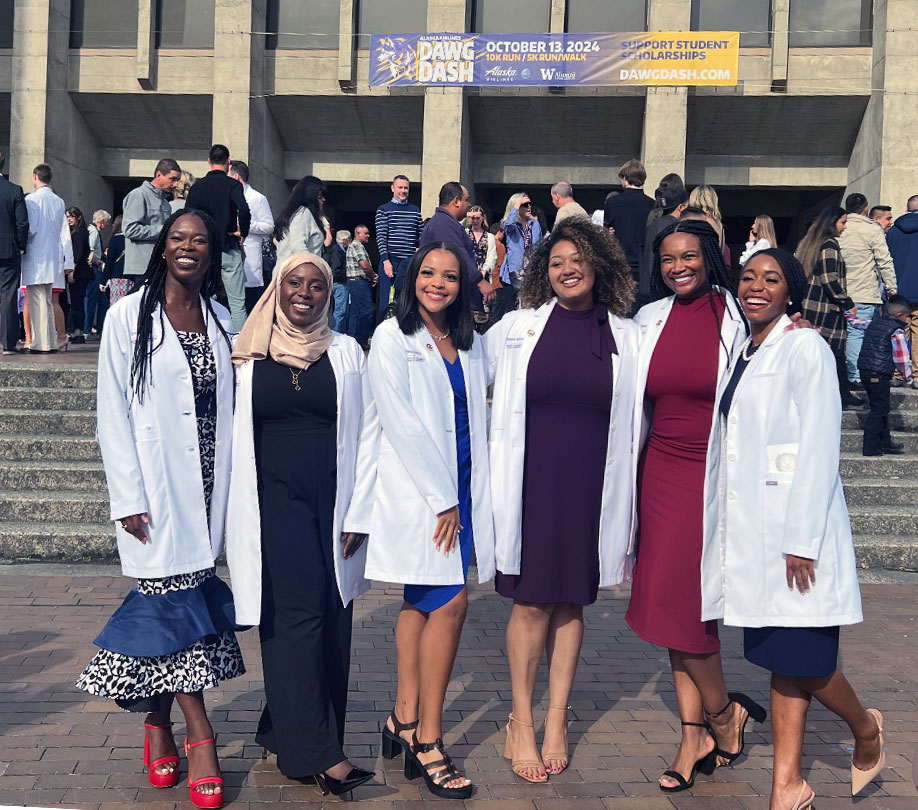 UW SNDA members from the Class of 2026 receive their white coats.