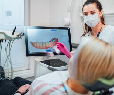 Dentist using digital equipment