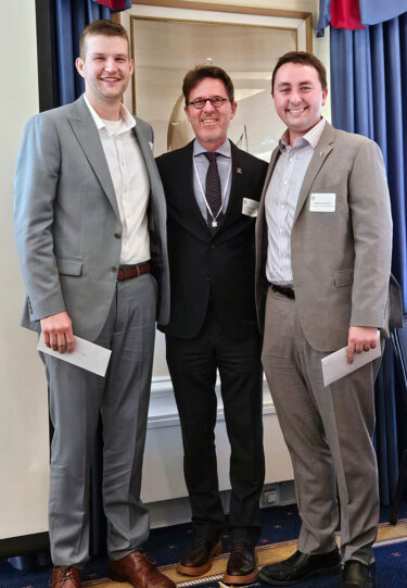 Class of 2026 OKU Scholarship recipients Gunnar Velikanje (’26) and Nathan Dahm (’26) with Dean Ritter.