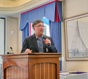 Dr. Alvin Wee gives the keynote address at the OKU banquet